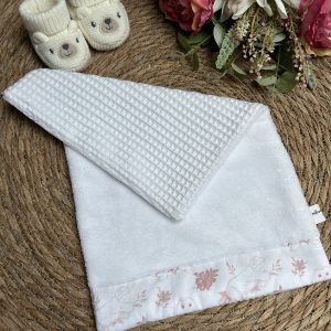 Petite serviette pour tapis à langer nomade